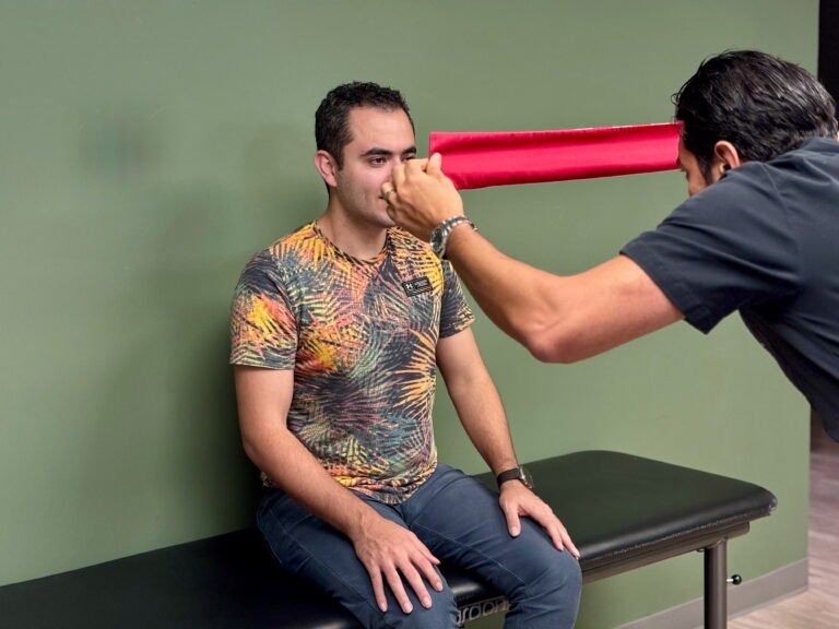 Dr. Chizari performing a neurological examination during vestibular rehabilitation in Calabasas